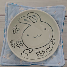 Load and play video in Gallery viewer, Bunnies &amp; Chicks on Light Blue with Polka Dots - Reversible 100% Cotton Bowl Cozy
