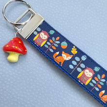 Load image into Gallery viewer, Fox and Owl Glittery Blue Key Fob Wristlet with Mushroom Charm
