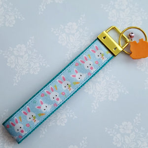 Bunnies with Carrots & Flowers on Light Blue Yellow Gold Key Chain Fob with Enameled Bunny Charm