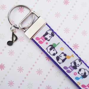 Pandas Sitting on Notes Key Chain Fob with Enameled Note Charm